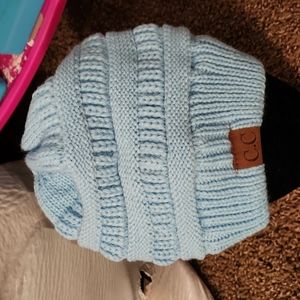 Beanie with Ponytail hole in the top for your hair to come through. 💙